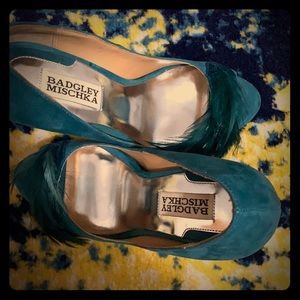 Teal stilettos with feather detail...